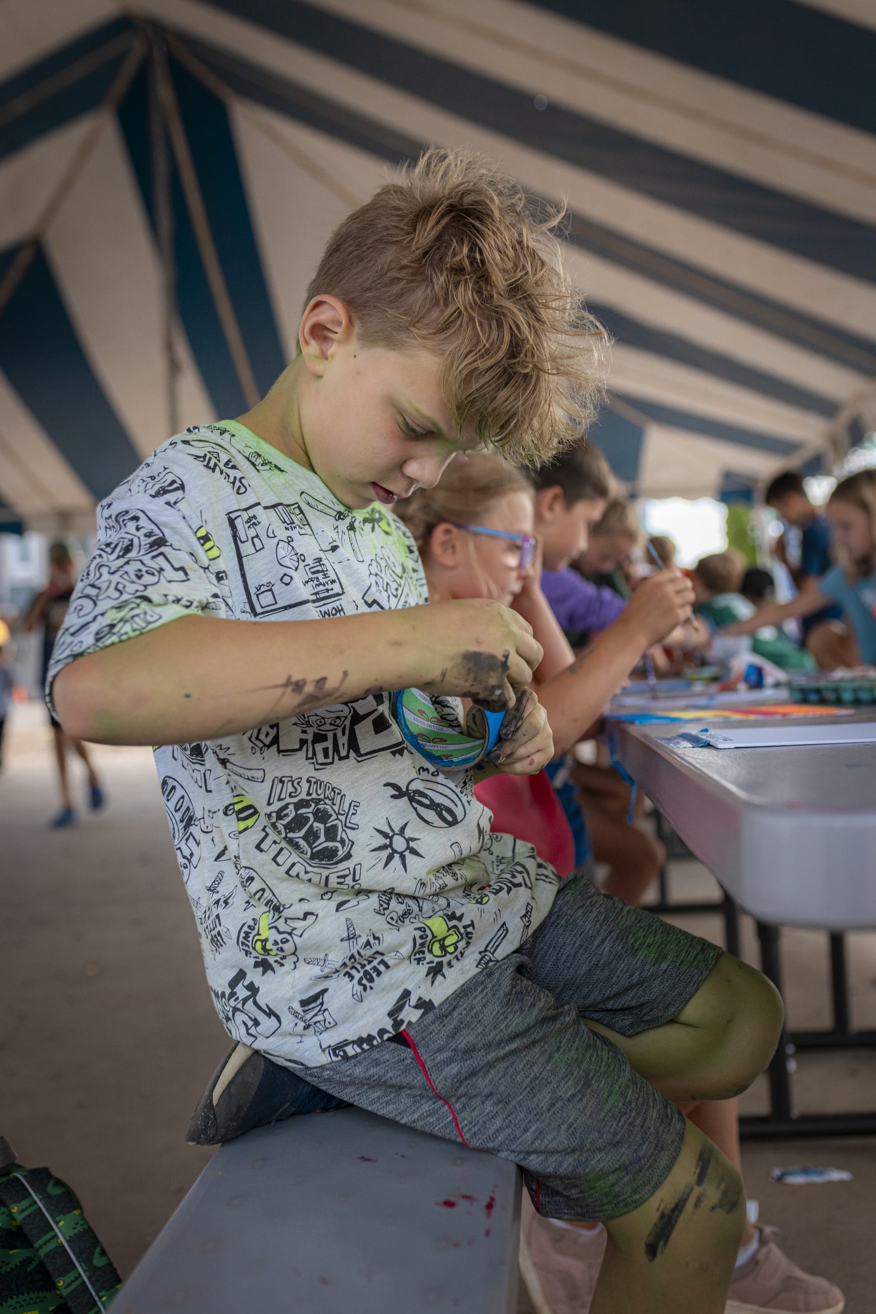 kid crafting at camp