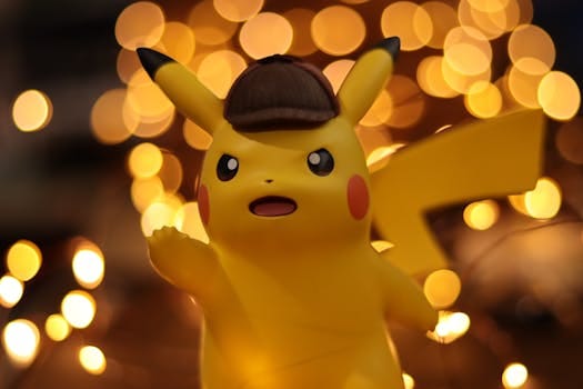 A close-up of a Pikachu figurine illuminated by a warm bokeh effect, creating an eye-catching visual. Mission Impossible Camp
