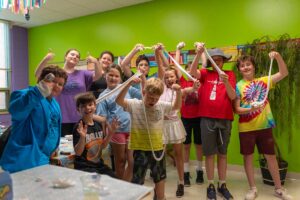 campers playing with goo at mad science camp