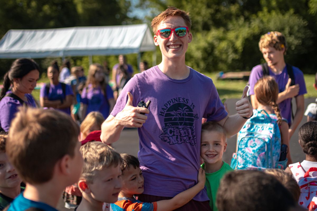 Campers Hugging Counselor 