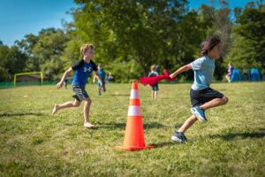 kids playing capture the flag at camp mirage