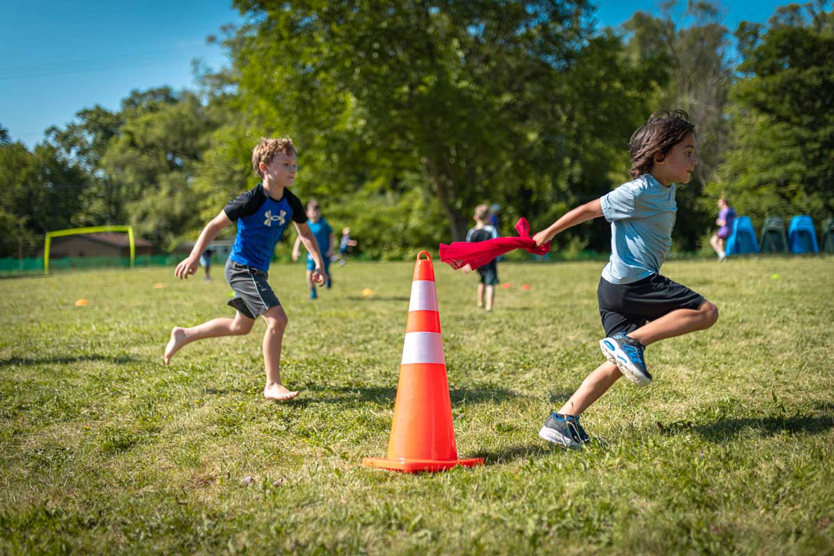 kids playing capture the flag at camp mirage